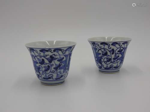 THREE BLUE AND WHITE WINE CUPS  18TH CENTURY painted with st...