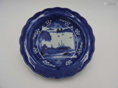 JAPANESE BLUE AND WHITE DISH  EDO PERIOD painted with a coas...