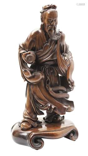 CARVED HARDWOOD FIGURE OF A SCHOLAR QING DYNASTY, 19TH CENTU...