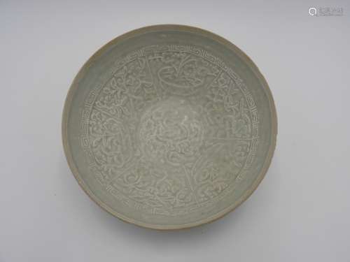 QINGBAI-TYPE BOWL carved with panels of flowering vases and ...