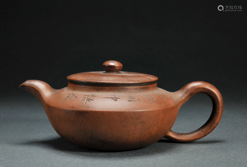 A Yixing Glazed Teapot