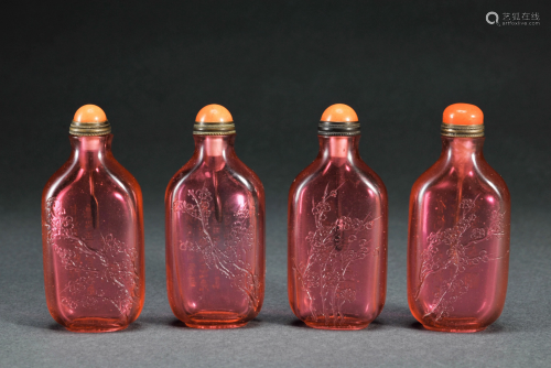 A Group of Four Peking Glass Snuff Bottles