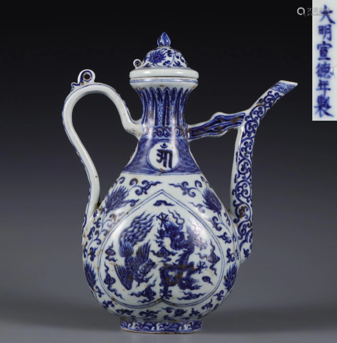 A Blue and White Dragon and Phoenix Ewer