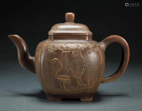 An Incised Yixing Glazed Teapot