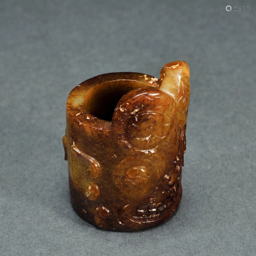 A Carved Jade Archers Ring