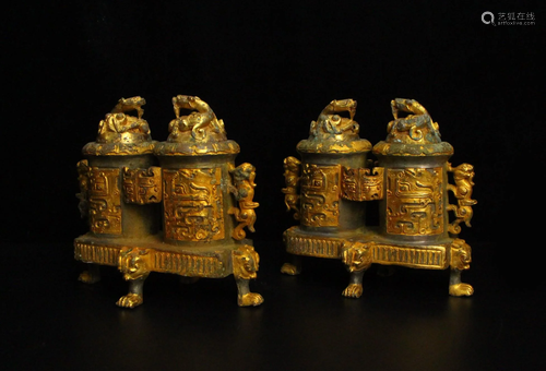 A pair of Han dynasty bronze partial gilt faucet