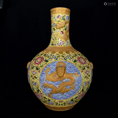 Qing Dynasty Qianlong famille rose embossed gilt