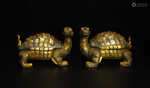 A pair of partial gilt tortoises from the Han dynasty