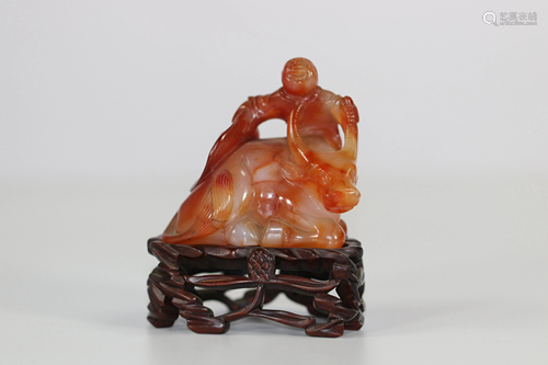 Child agate statuette on a buffalo, China Qing period.