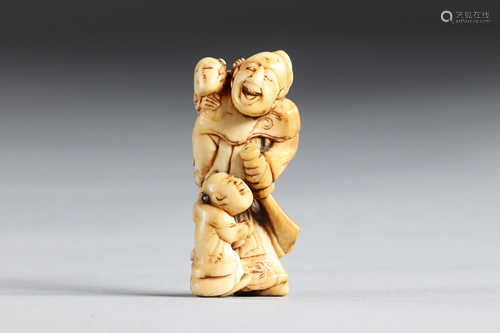 Netsuke carved - a character and children. Japan Edo