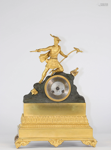 Empire period gilt bronze clock surmounted by a