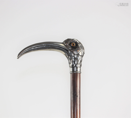 Pommel cane decorated with a silver bird circa 1900