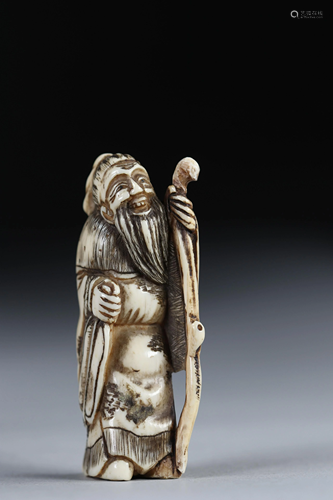 Netsuke carved - a character. Japan Meiji period around