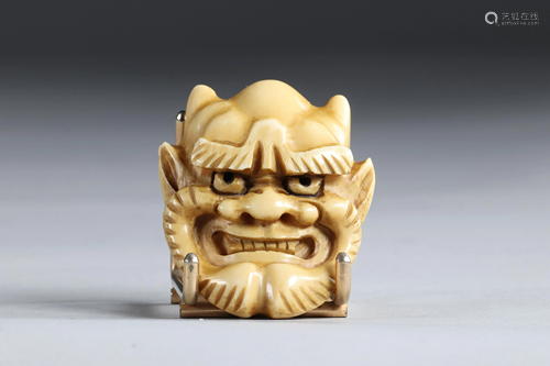 Netsuke carved - a demon mask .. Japan Meiji period