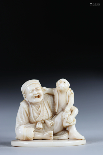 Netsuke carved - a monkey pulling the ear - his master.