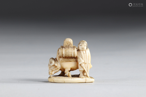 Netsuke carved - a figure and a buffalo. Japan Meiji