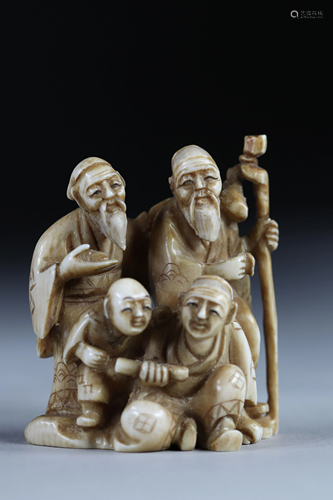 Netsuke carved from a group - figures. Japan Meiji