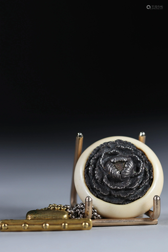 Netsuke Manju circular bronze top - flower decoration.