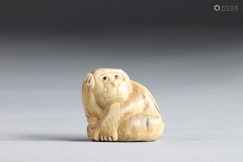 Netsuke carved - a pensive monkey. Japan Meiji period