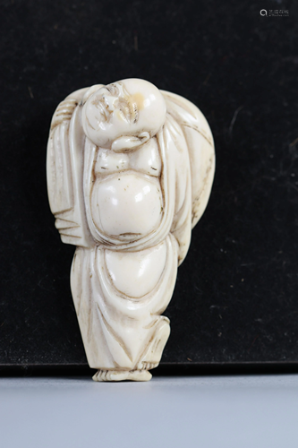 Netsuke carved - a Buddha. Japan Meiji period around