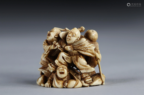 Intricately carved Netsuke - a wrestling scene. Japan