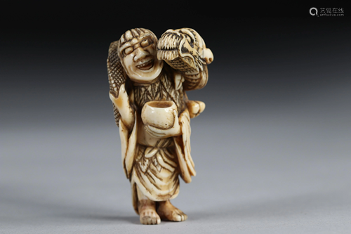 Netsuke / Okimono carved - Gama-Sennin carrying a