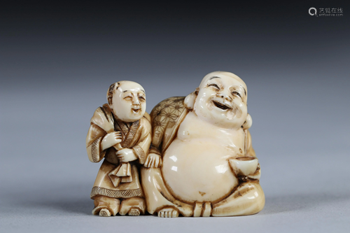 Netsuke carved - Buddha and a child. Japan Meiji period