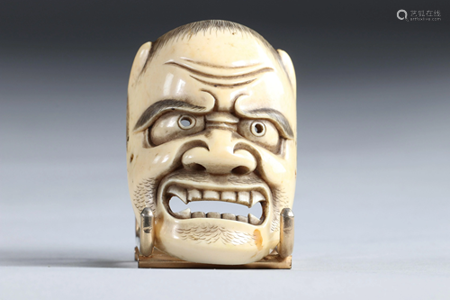 Netsuke / Okimono carved - a mask. Japan MEiji 19th