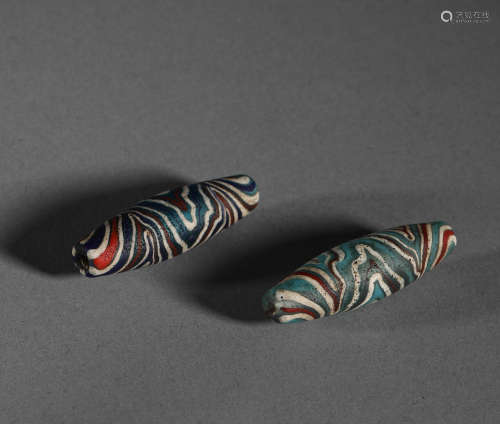 Han Dynasty - A pair of Colored Glaze Dzi Beads