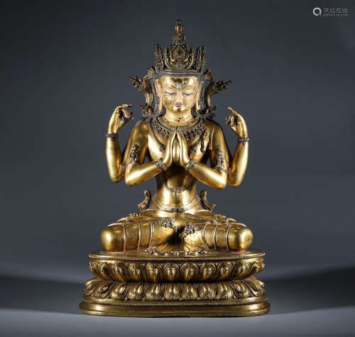 Qing Dynasty - A Gilt Bronze Statue of Guanyin with Four Arm...