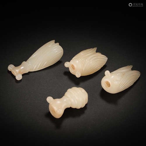 A GROUP OF HETIAN JADE SILKWORMS, THE WESTERN ZHOU DYNASTY I...