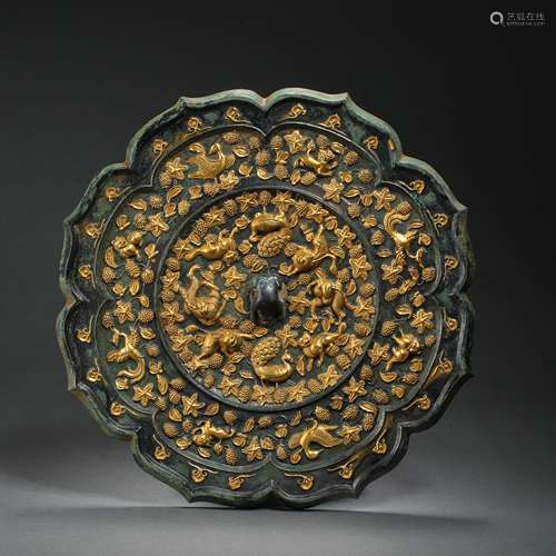 PARTIAL GILT MIRROR, TANG DYNASTY, CHINA