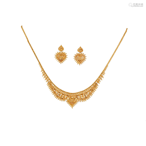 An eastern necklace and matching earrings