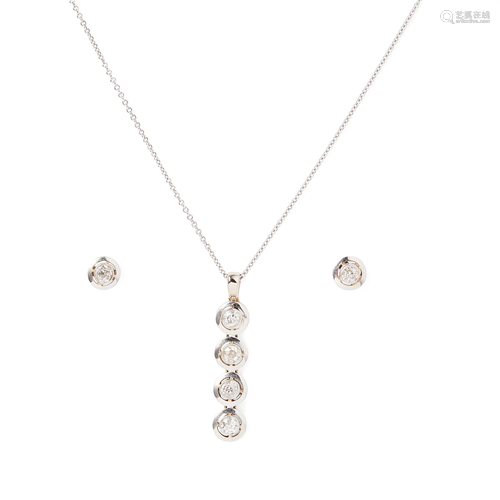 A diamond pendant and matching earrings