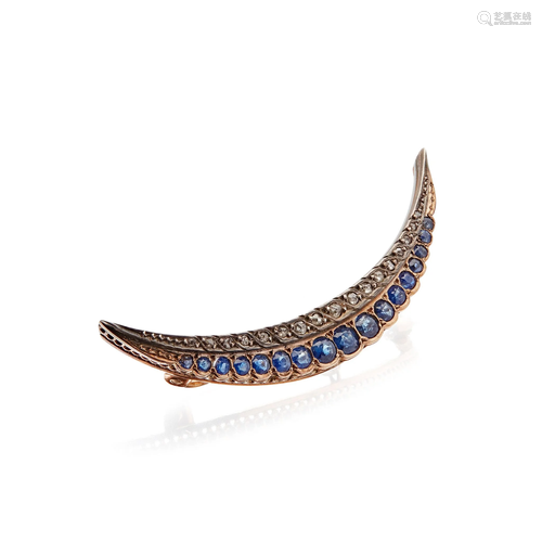 A sapphire and diamond set crescent brooch