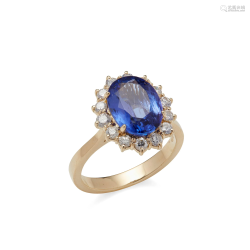 A Tanzanite and diamond set cluster ring
