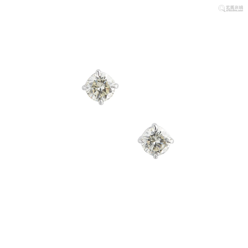 A pair of diamond set stud earrings