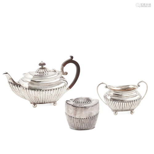 A matched 1920s bachelor's teapot and twin handled