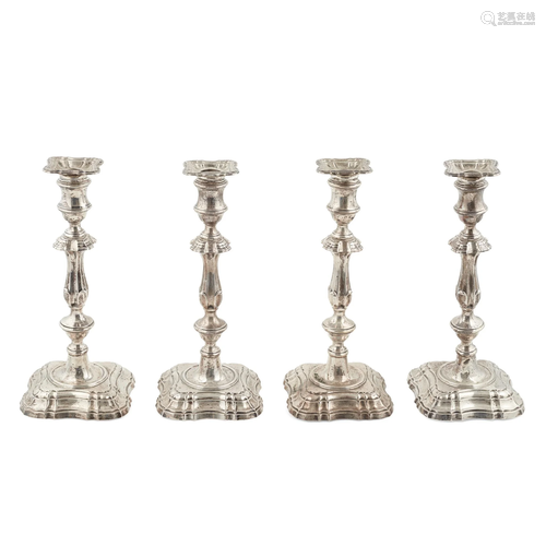 A set of four late Victorian candlesticks