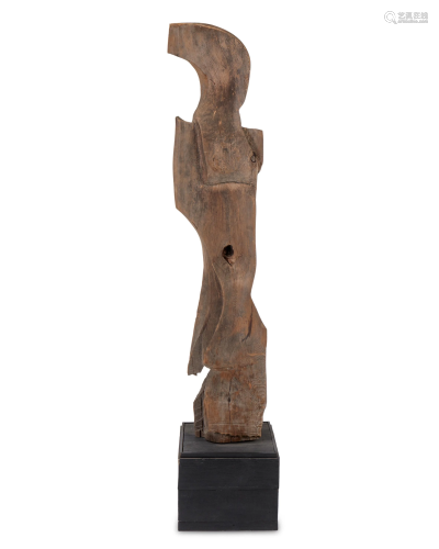 A free-form carved wood sculpture