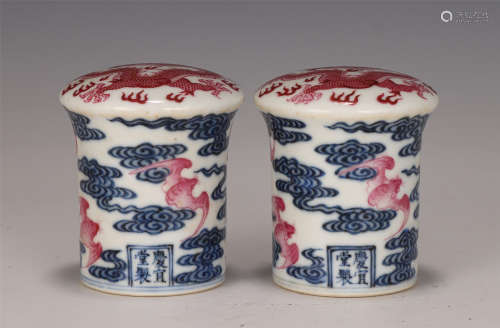 TWO CHINESE BLUE AND WHITE PORCELAIN SCROLL CAPS