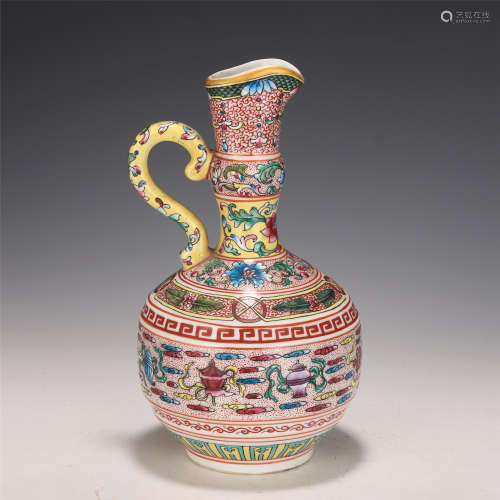 A CHINESE FAMILLE ROSE PORCELAIN HANDLED EWER
