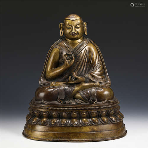 A CHINESE BRONZE FIGURE OF BUDDHA