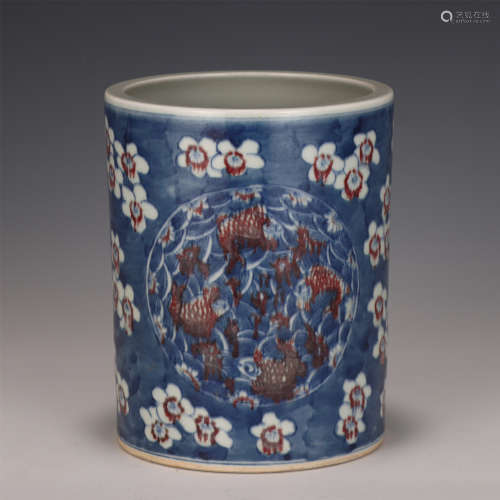 A CHINESE BLUE AND WHITE UNDERGLAZED RED PORCELAIN BRUSH POT