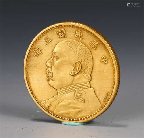 A CHINESE GOLD COIN
