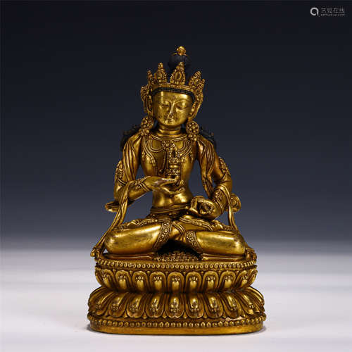 A CHINESE GILT BRONZE FIGURE OF GUANYIN BUDDHA