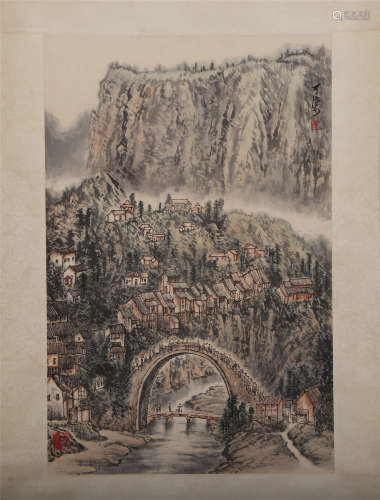 A CHINESE PAINTING OF VILLAGE AND MOUNTAINS