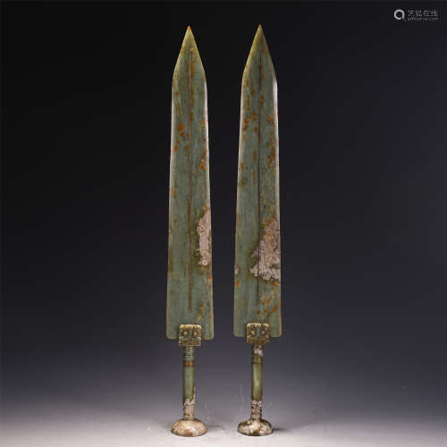 A PAIR OF CHINESE JADE SWORDS