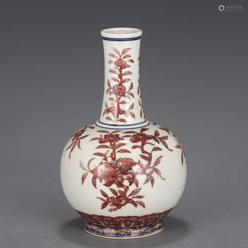 A CHINESE BLUE AND WHITE UNDERGLAZED RED PORCELAIN VASE