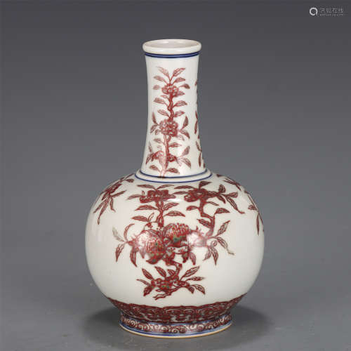 A CHINESE BLUE AND WHITE UNDERGLAZED RED PORCELAIN VASE